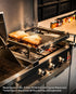 Brazilian asado-style ribs cooking over charcoal on the Tucker R Class BBQ Cypriot attachment
