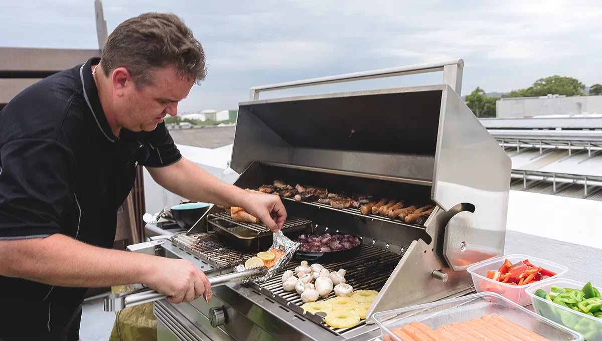 Tucker Charcoal Deluxe Pro BBQ on Cabinet with Hinged Lid